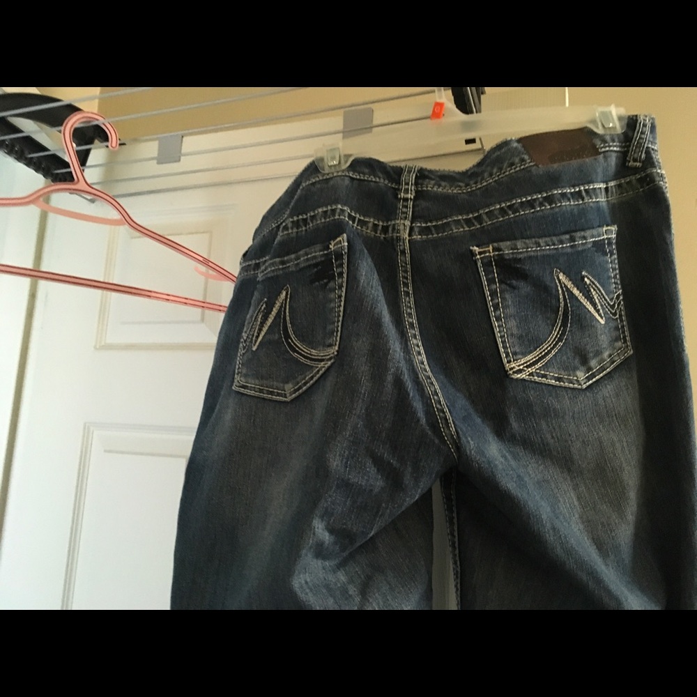 Maurice.   Boot cut jeans.  Size. 13/14